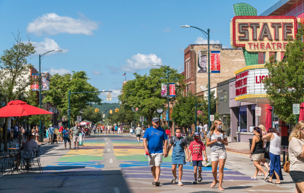 Traverse City, MI, US-August 16, 2020: Busy Front Street in downtown with State Street Theater.