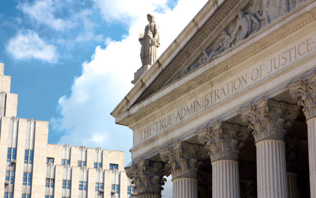 New York State Supreme Court building in Lower Manhattan showing the words 