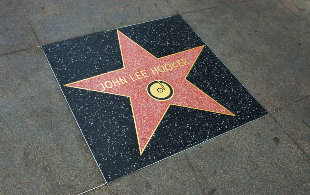 Los Angeles, USA - April 18, 2014: John Lee Hooker star on Hollywood Walk of Fame in Hollywood, California. This star is located on Hollywood Blvd. and is one of over 2000 celebrity stars embedded in the sidewalk.