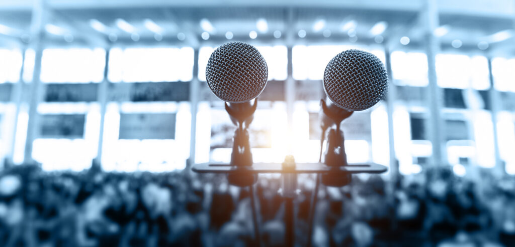 Closeup microphone in auditorium.
