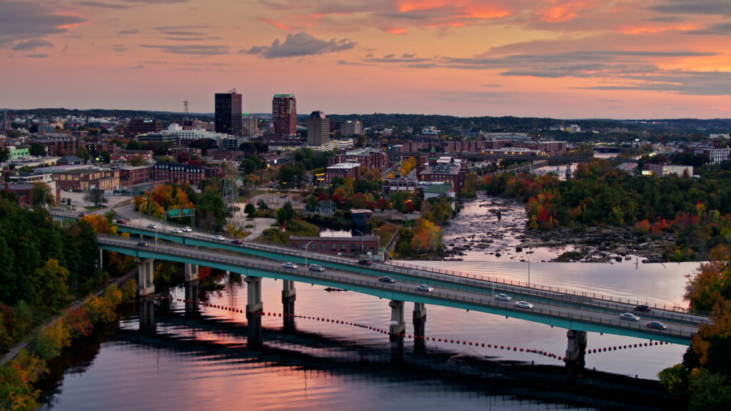 Aerial establishing shot of Manchester, New Hampshire in Fall.